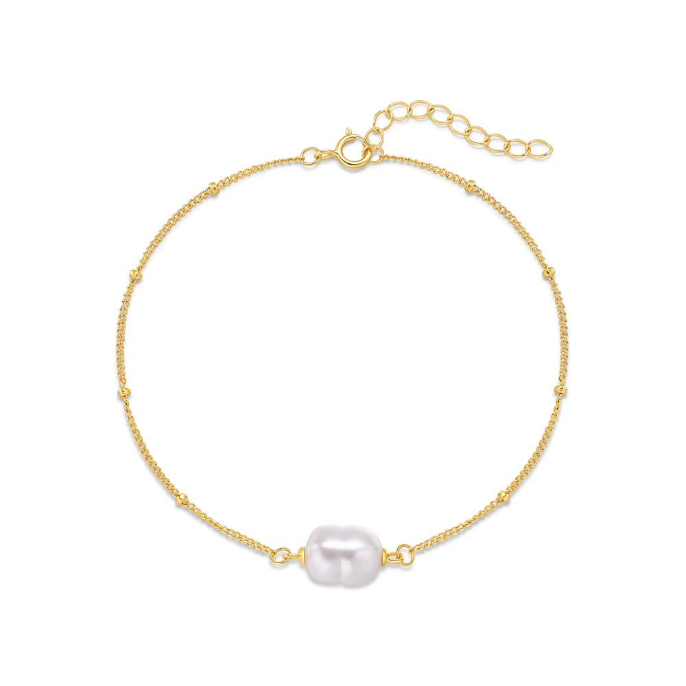Pulsera AIDE de plata 925 con circonita, cruz, flor y perla barroca