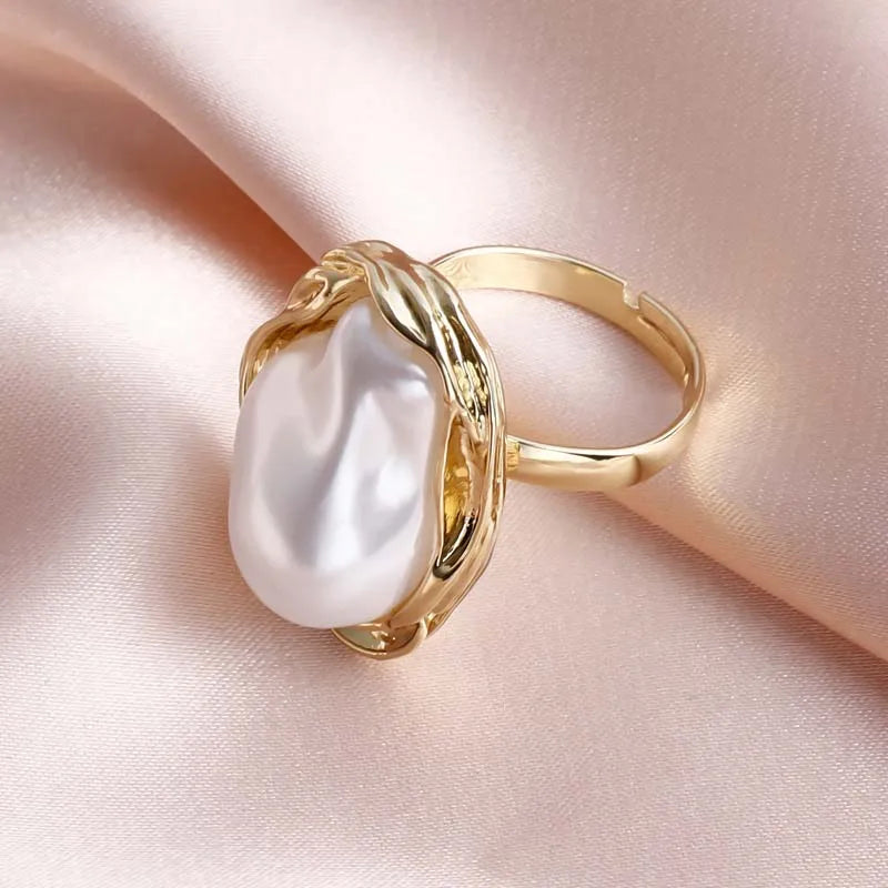 Anillo abierto vintage con perla blanca e incrustación de estrella de mar 2025