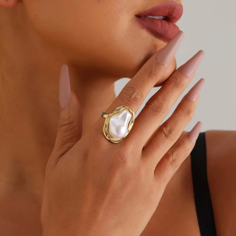 Anillo abierto vintage con perla blanca e incrustación de estrella de mar 2025