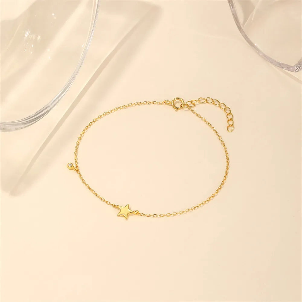 Pulsera AIDE de plata 925 con circonita, cruz, flor y perla barroca
